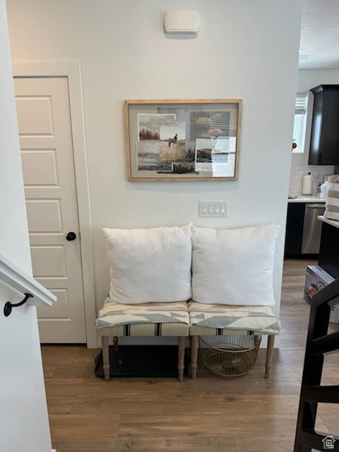Living area with wood finished floors