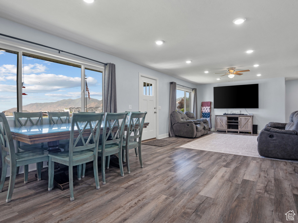 Dining area featuring wood finished floors, recessed lighting, ceiling fan, and baseboards