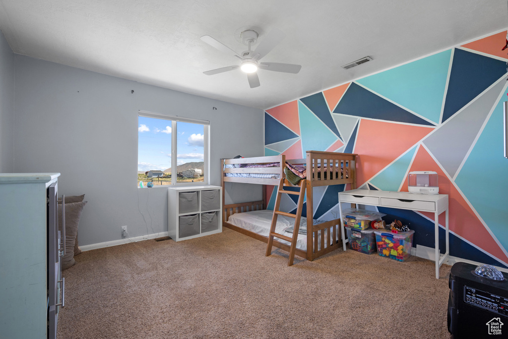 Carpeted bedroom with baseboards
