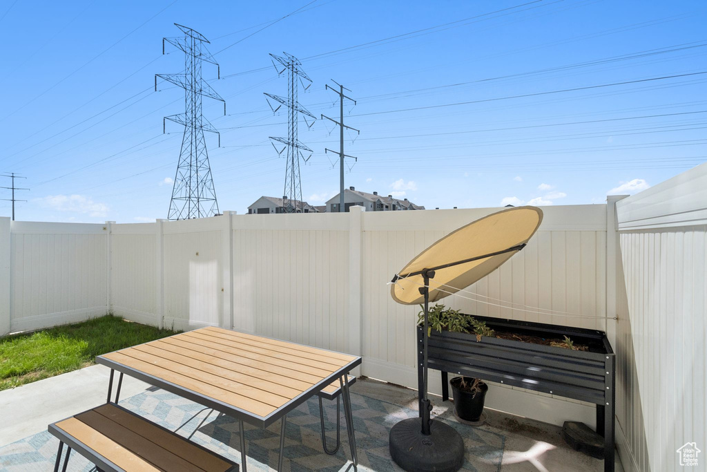 Fenced backyard featuring a patio and outdoor dining space