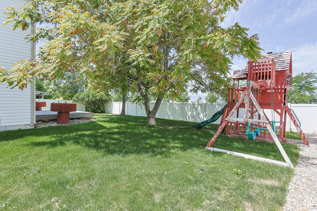 View of yard featuring a playground