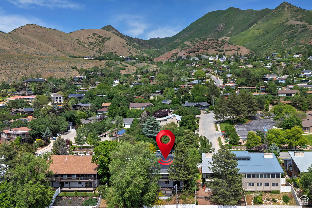 Aerial view of residential area with a mountain backdrop