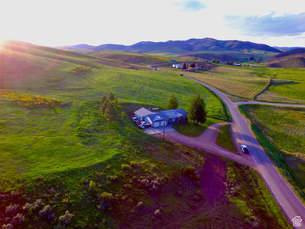 Aerial view of sparsely populated area featuring a mountain backdrop