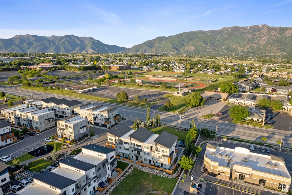 Aerial perspective of suburban area with a mountain backdrop