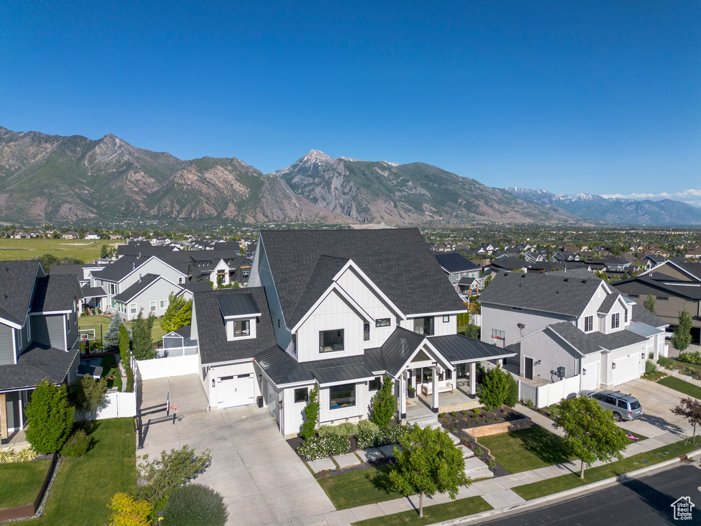 View of mountain backdrop with nearby suburban area