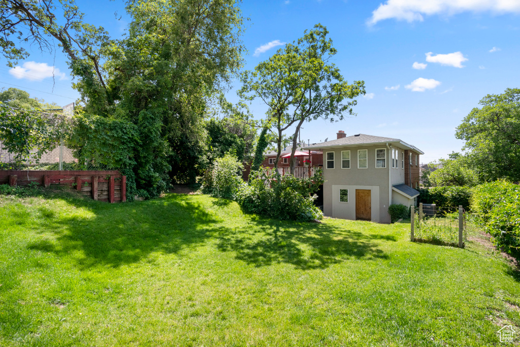 View of yard with a deck