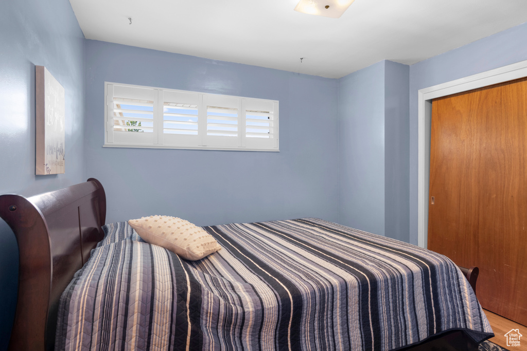 Bedroom featuring wood finished floors