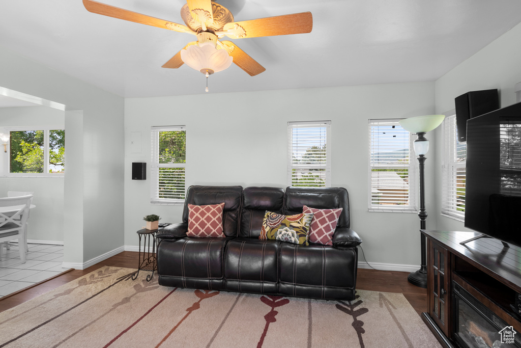 Living room with plenty of natural light and wood finished floors
