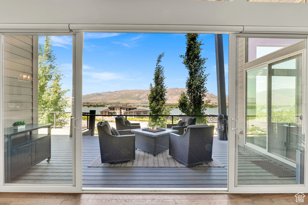 Entryway featuring a mountain view and wood finished floors