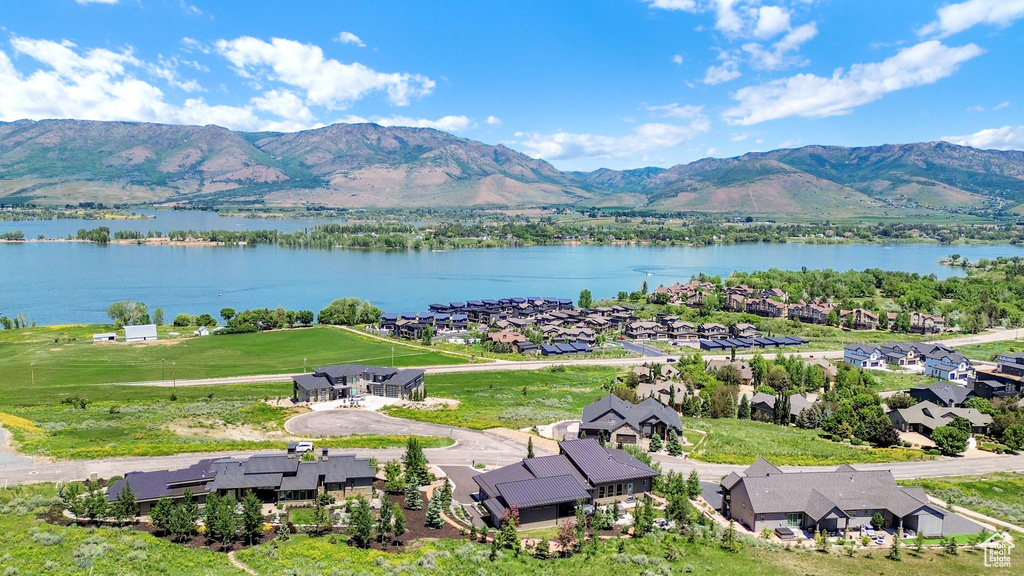 Aerial view of residential area with a water and mountain view