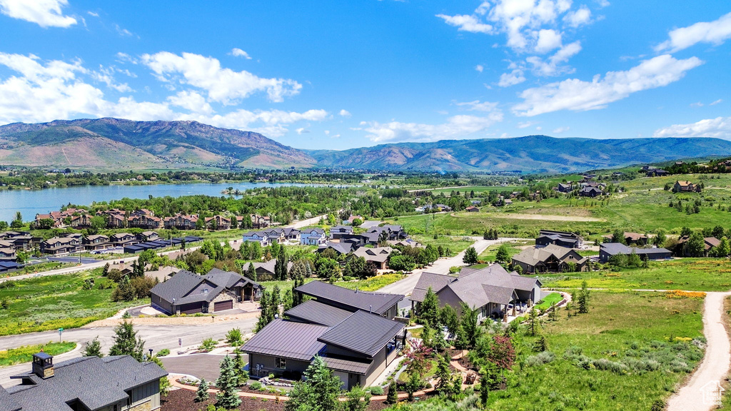 Aerial view of residential area with a water and mountain view