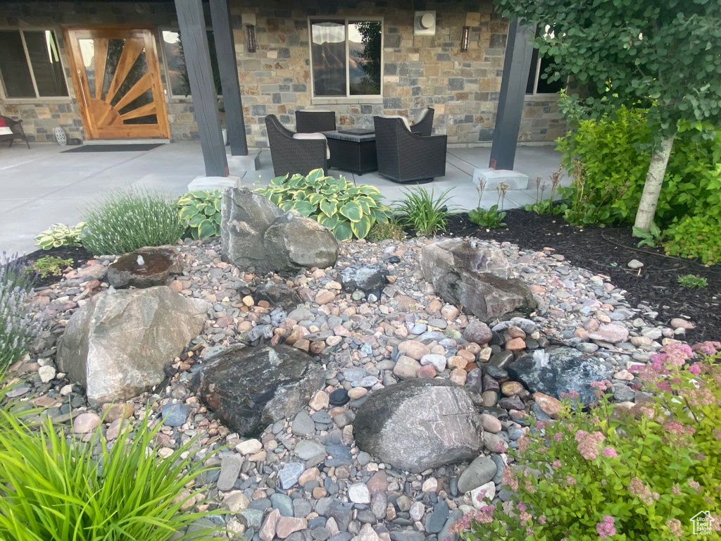 View of patio with an outdoor living space