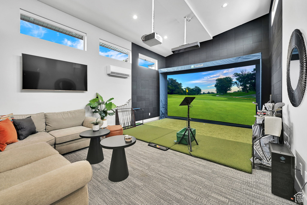 Game room featuring golf simulator, a wall unit AC, carpet, and recessed lighting