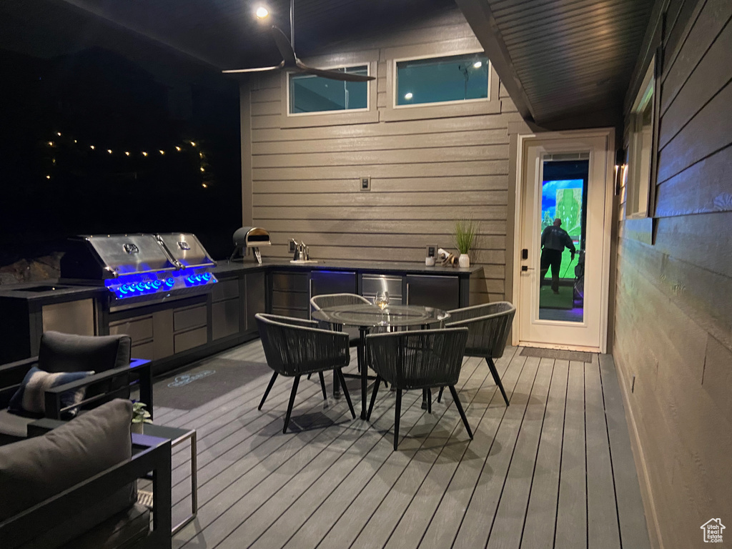 Wooden deck with outdoor dining space