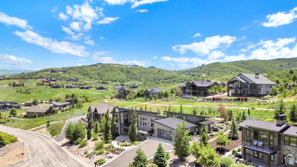 View of mountain backdrop with nearby suburban area