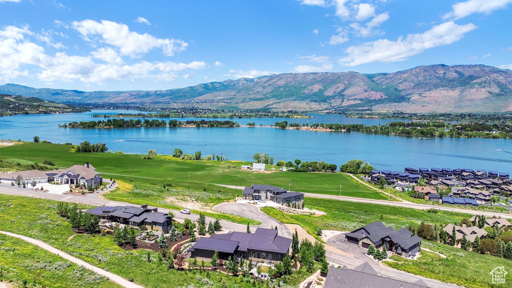 Aerial view of residential area with a water and mountain view