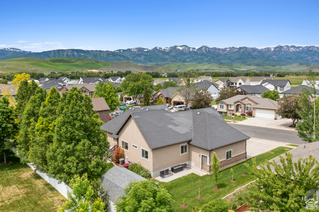 Aerial perspective of suburban area featuring mountains