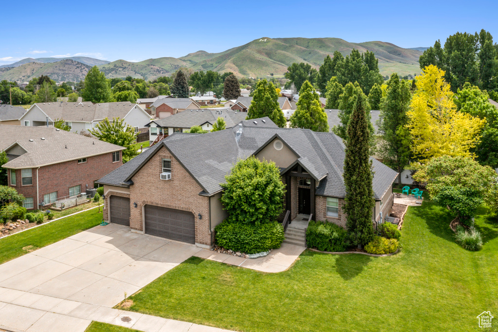 View of mountain backdrop with nearby suburban area