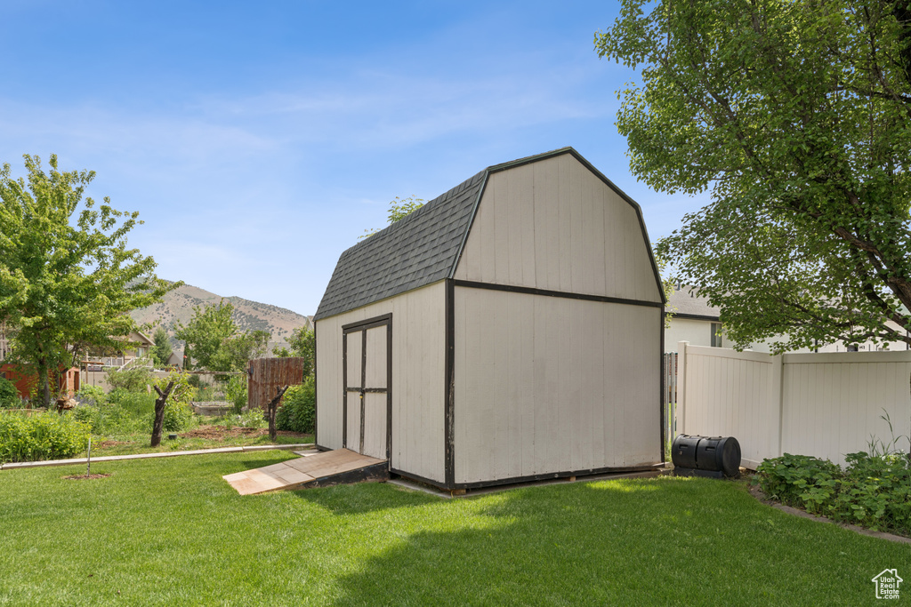 View of shed with a mountain view