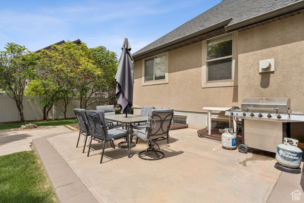 View of patio / terrace featuring area for grilling and outdoor dining space