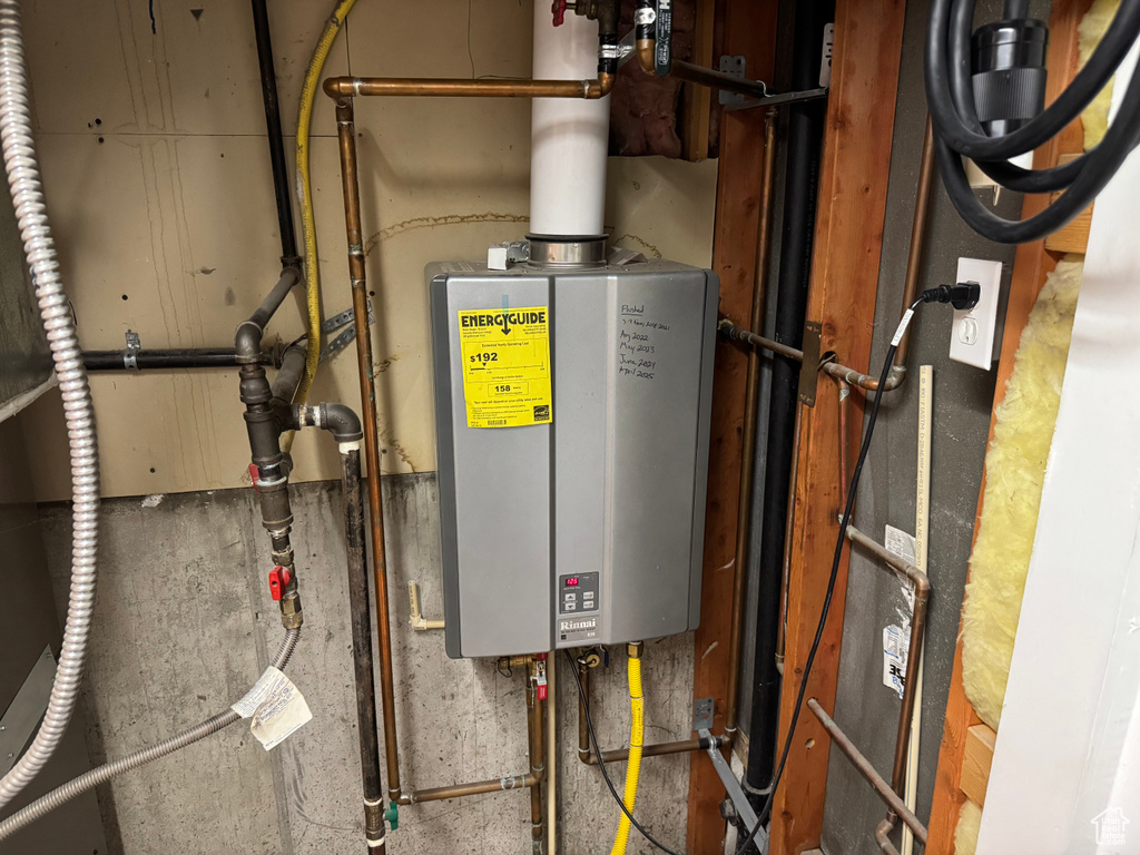 Utility room with tankless water heater