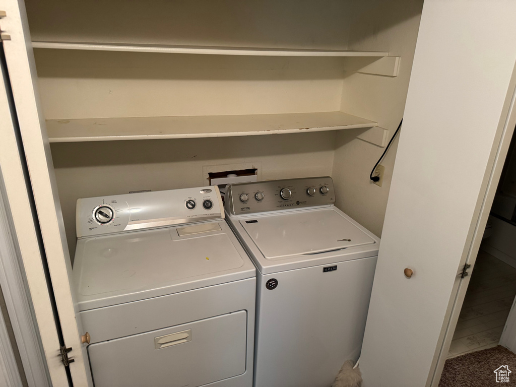 Laundry area featuring washer and clothes dryer