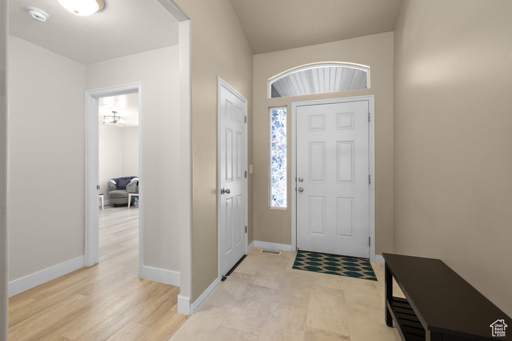 Foyer with baseboards