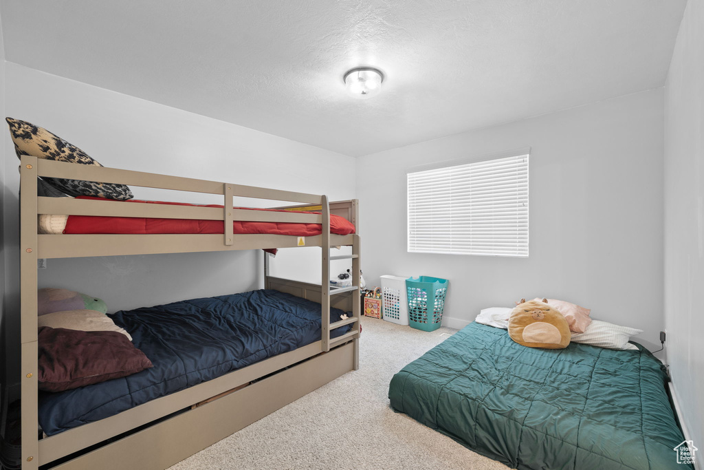 Bedroom featuring carpet