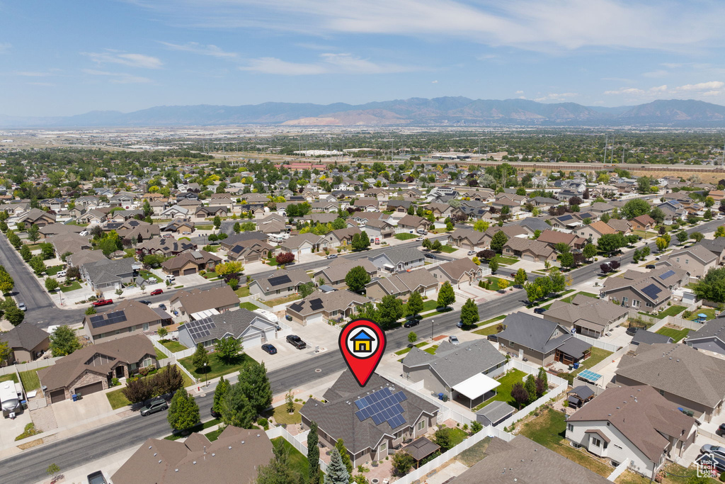 Aerial perspective of suburban area featuring mountains