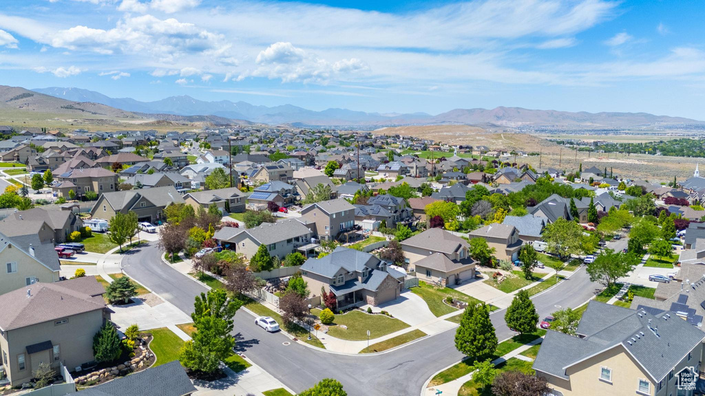 Aerial perspective of suburban area with mountains
