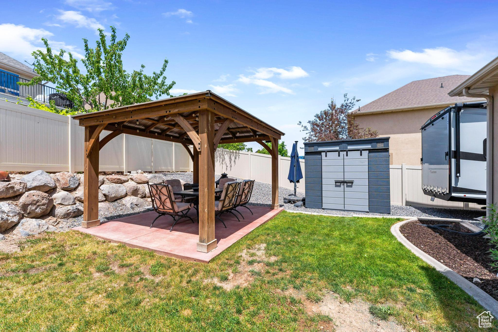 View of yard featuring a gazebo and a patio area
