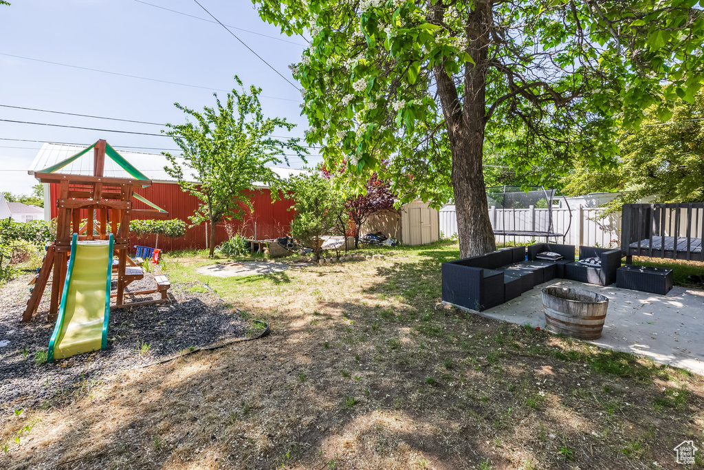 View of yard with a playground, a patio, and outdoor lounge area