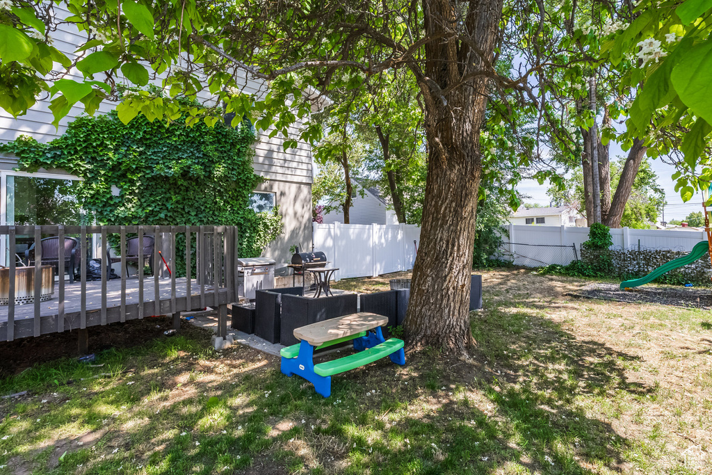 View of yard featuring a deck