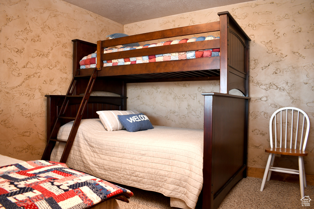 Bedroom featuring carpet