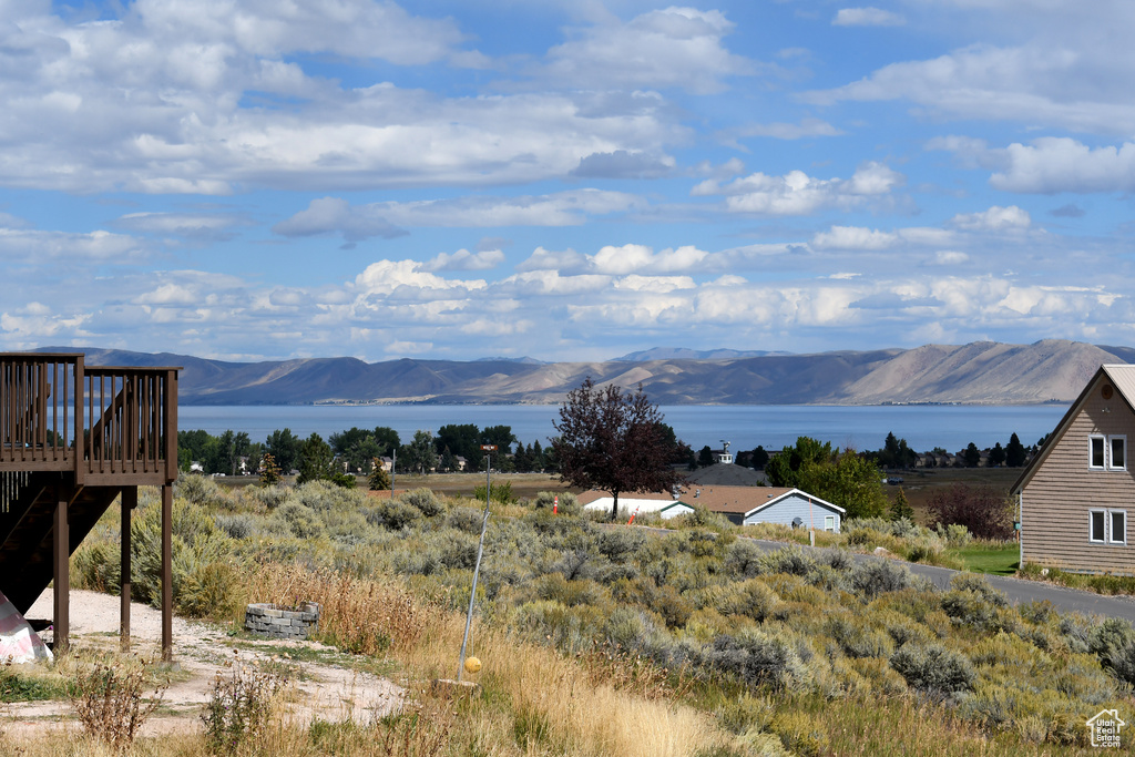 View of mountain backdrop with a nearby body of water