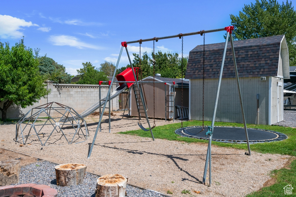 View of play area featuring a trampoline