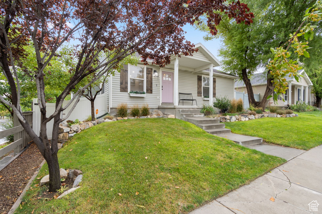 View of front of property featuring covered porch