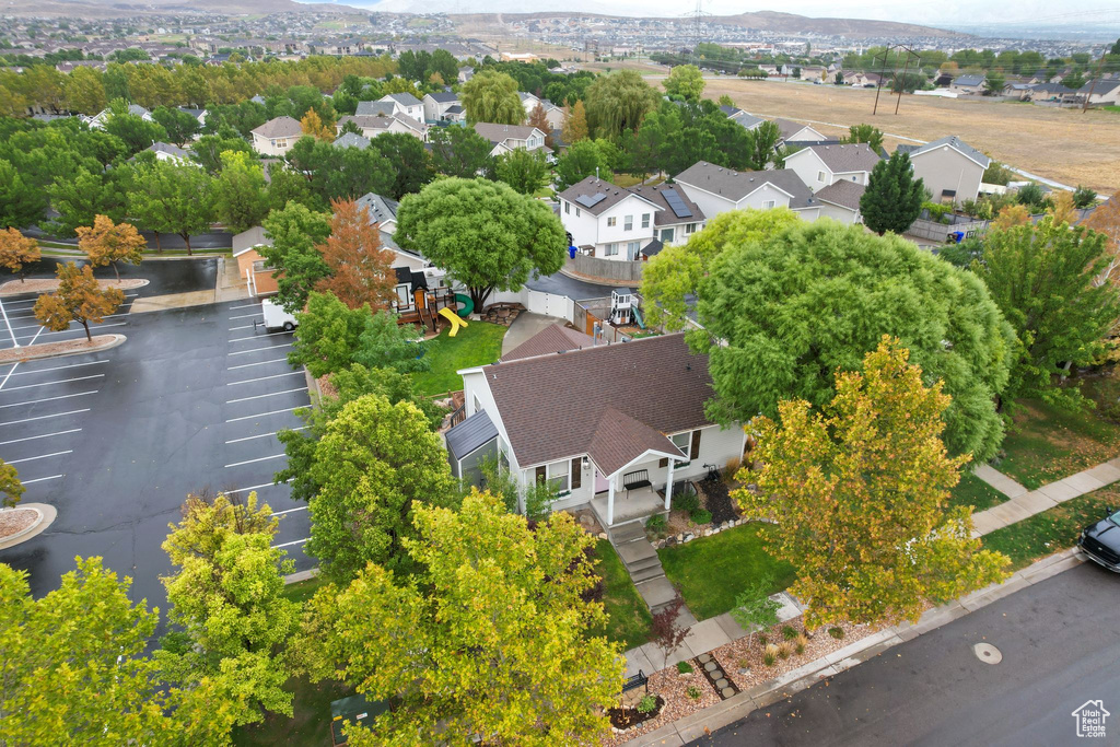 Aerial view of residential area featuring a mountain backdrop