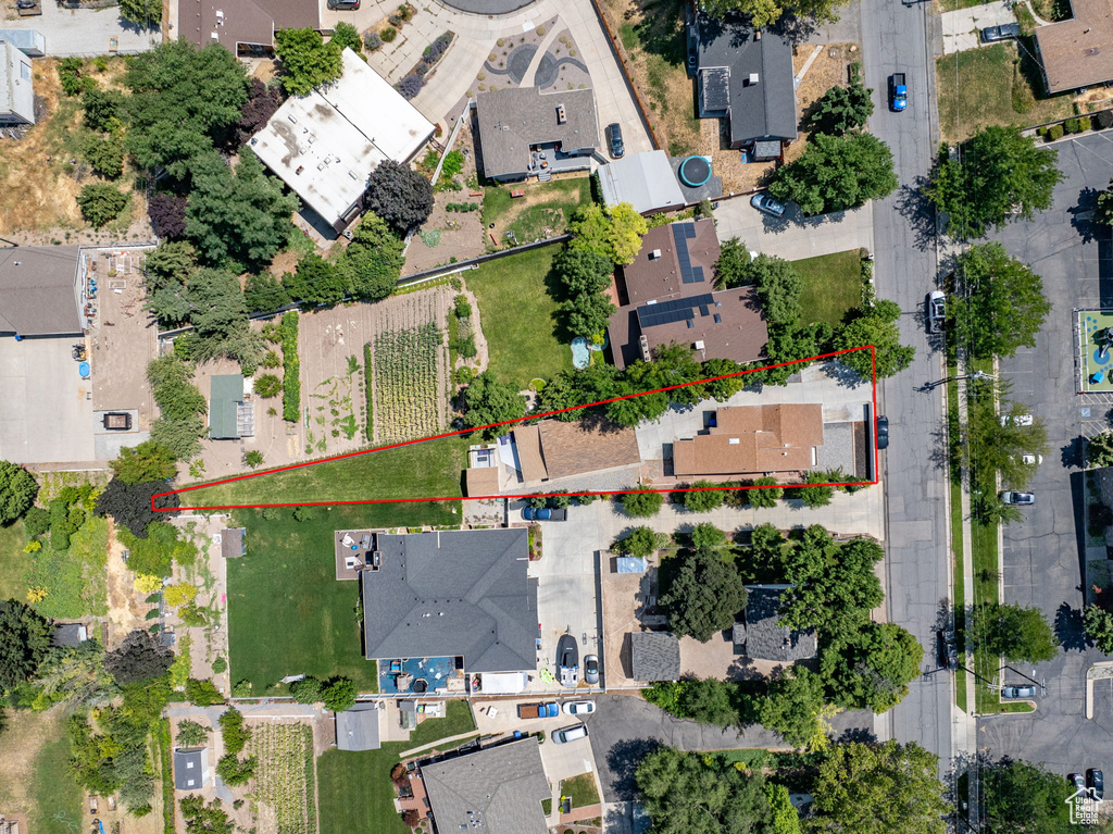 Aerial perspective of suburban area with property parcel outlined