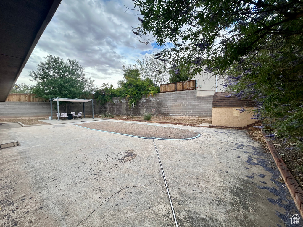 Fenced backyard featuring a patio area