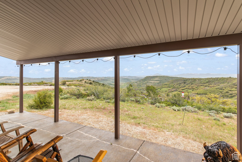 View of patio with a mountain view