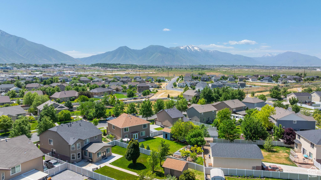 Aerial view of residential area with mountains