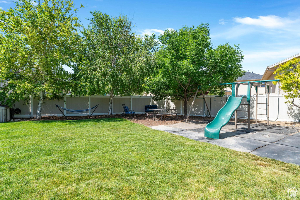 View of yard with a playground