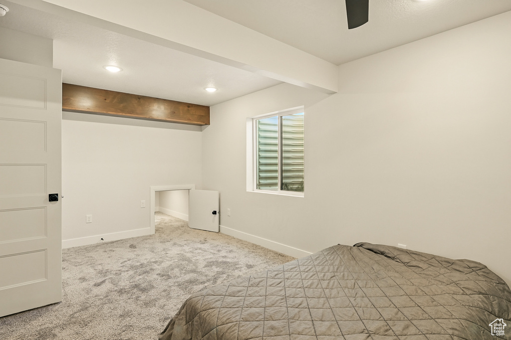 Carpeted bedroom with baseboards, recessed lighting, and a ceiling fan