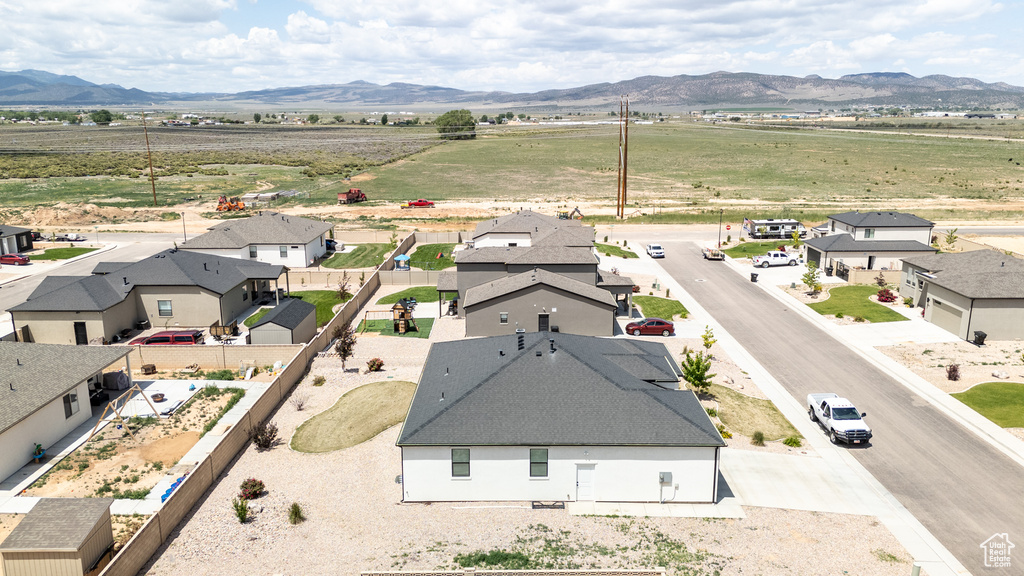 Aerial view of residential area with a mountainous background