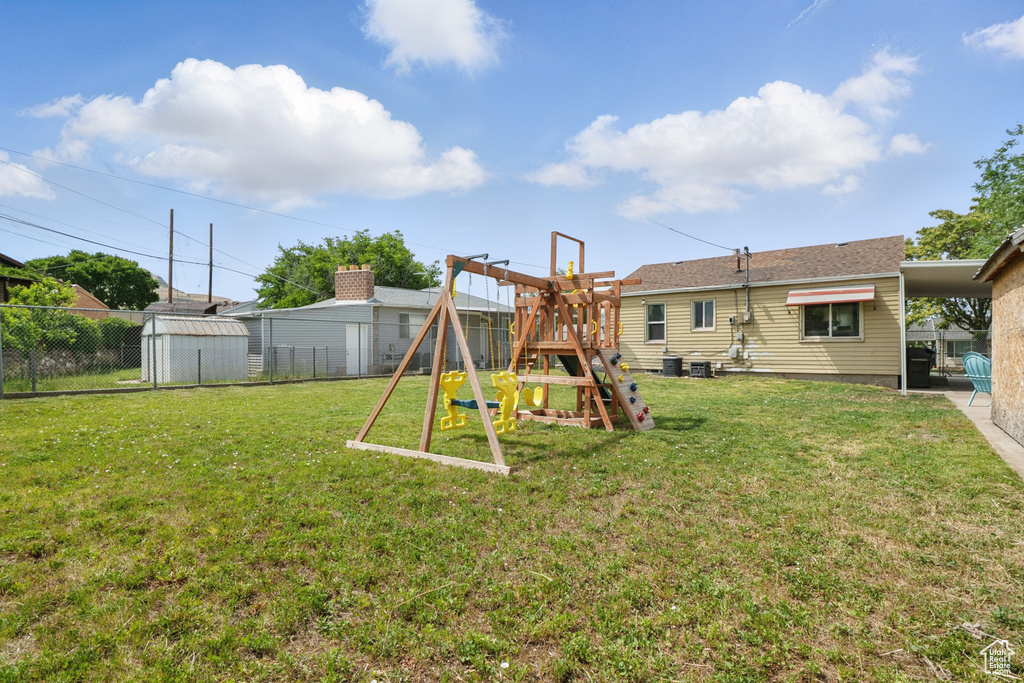 View of yard with a playground