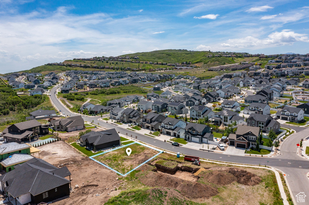 Aerial perspective of suburban area with property parcel outlined
