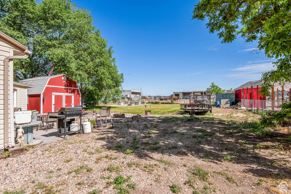 View of yard featuring a fire pit