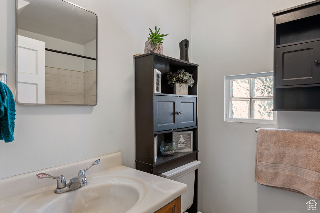 Bathroom featuring toilet and vanity