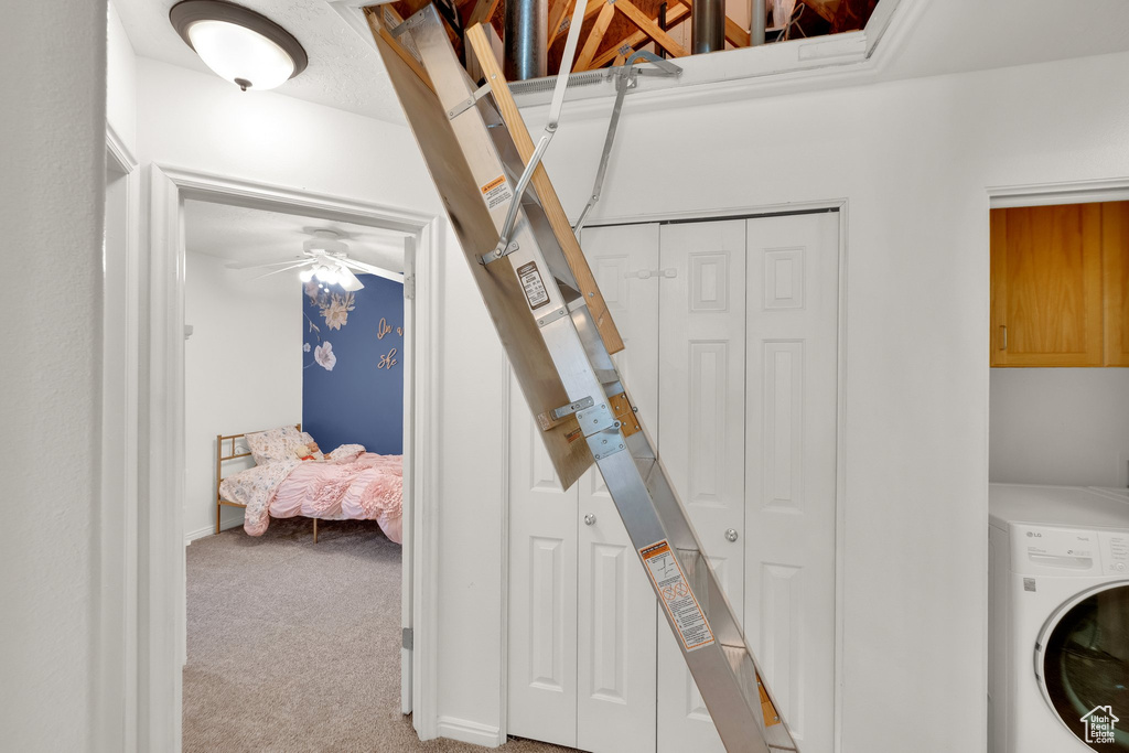Washroom with washer / dryer, carpet flooring, cabinet space, and a ceiling fan